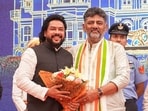Karnataka chief minister DK Shivakumar and minister B Nagendra at Lok Bhavan, in Bengaluru.