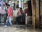 Massive waterlogging is seen inside Teliwara Market in the Sadar Bazaar area , in New Delhi.