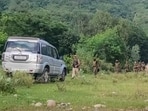 Security personnel keep vigil during a joint search-and-combing operation after an active wireless signal was detected, in Samba, Jammu and Kashmir, on Tuesday. (PTI)