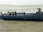 The labourers in the boat were placing sandbags into the Ganga to stop erosion after the flood situation worsened following a breach in the embankment two days ago, inundating several villages. (ANI)