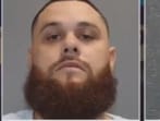 Alex James Barnett, 33, was arrested for the murder of Tucson's Carlos Ramirez, following speculation he resembled the 'porch guy' from a doorbell video.