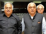 Former assembly speaker (L)Kuldeep Sharma with ex-CM (R) Bhupinder Singh Hooda in the assembly complex in Chandigarh.