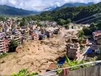 Nepal floods: In this screengrab from a video posted on Aug. 26, 2026, Floodwater flows across a residential area, in Nepal. (PTI)