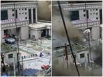 A CCTV footage shows people running away as wall of mud and water destroys buildings in a valley at Nepal-China border, in Gyirong, Tibet region.