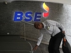A man touches the stairs as he arrives at the Bombay Stock Exchange (BSE) building in Mumbai(REUTERS/File)
