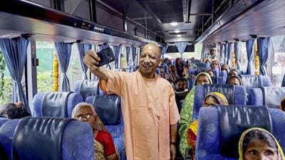 Chief minister Yogi Adityanath takes a selfie during the launch of the ‘Lokmata Ahilyabai Matrushakti Yatra’ scheme, in Lucknow on Wednesday. (PTI PHOTO) Chief minister Yogi Adityanath takes a selfie during the launch of the ‘Lokmata Ahilyabai Matrushakti Yatra’ scheme, in Lucknow on Wednesday. (PTI PHOTO)