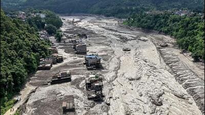 Over 50 Tamil Nadu pilgrims are stranded near the Nepal-China border after flash floods killed at least nine people and damaged roads and infrastructure. (AFP)