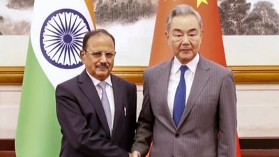 National Security Advisor Ajit Doval with China Foreign Affairs Minister Wang Yi. (Handout) National Security Advisor Ajit Doval with China Foreign Affairs Minister Wang Yi. (Handout)