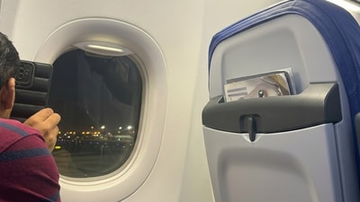 Man shares airplane view with family. (Representative Image) Man shares airplane view with family. (Representative Image)