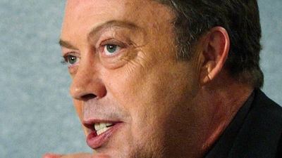 Actor Tim Curry discusses his new voice-over animated film "The Wild Thornberrys Movie", which co-stars the voice Lynn Redgrave at a news conference at the Toronto International Film Festival in 2002. (AFP)