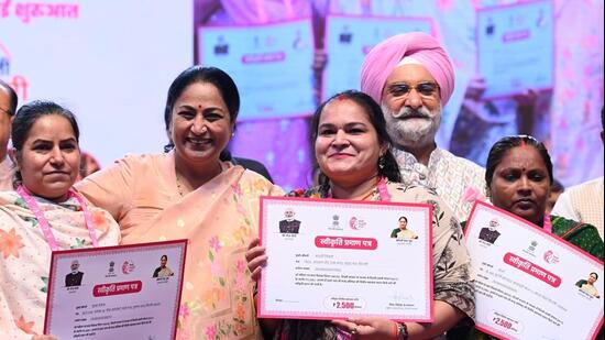 CM Rekha Gupta and LG Taranjit Singh Sandhu at the launch. (Vipin Kumar/HT Photo)