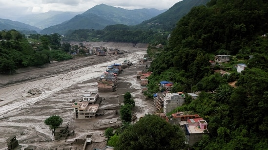 A drove view of mud covered properties following a flash flood at Trishuli in Nuwakot district, Nepal, August 26, 2026. 