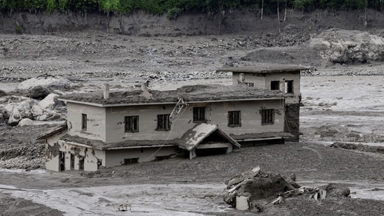 A mud-covered building following a flash flood at Trishuli in Nuwakot district, Nepal, August 26, 2026. 