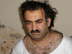FILE- Khalid Sheikh Mohammed, the alleged Sept. 11 mastermind, is seen shortly after his capture during a raid in Pakistan Saturday March 1, 2003 in this photo obtained by the Associated Press. The man accused of being the main plotter in al-Qaeda's Sept. 11, 2001 attacks has agreed to plead guilty, The Defense Department said Wednesday. AP/PTI(AP08_01_2024_000053A)(ASSOCIATED PRESS)