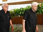 Congress Legislature Party (CLP) leader Bhupinder Singh Hooda walking behind former Speaker Raghuvir Singh Kadian at the Vidhan Sabha in Chandigarh on Thursday. The Congress leaders were attired in black to protest against the policies of the state BJP government. (Keshav Singh/HT)