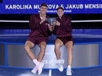 Karolina Muchova of Czechia and Jakub Mensik of Czechia pose for a photo during the trophy presentation after defeating Belinda Bencic of Switzerland and Flavio Cobolli of Italy in the Mixed Doubles Fina(Getty Images via AFP)