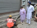 Mayor Inderjit Kaur inspected the work on Wednesday and said restoring the capacity of the old sewer line would improve sewage flow. (HT Photo) Mayor Inderjit Kaur inspected the work on Wednesday and said restoring the capacity of the old sewer line would improve sewage flow. (HT Photo)