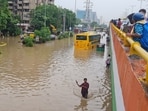 Gurugram, India-August 24, 2026: School buses remain stuck on a waterlogged road following heavy monsoon rain at Subhash Chowk near Sector 47 in Gurugram, India, on Monday, 24 August 2026.(Photo by Hindustan Times)(Hindustan Times)