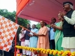 Uttar Pradesh chief minister Yogi Adityanath launches free bus travel scheme for elderly women, in Lucknow on Wednesday. (ANI PHOTO)