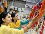 Women buying Rakhi ahead of Raksha Bandhan eve in Chandigarh on Thursday. (Ravi Kumar/HT)