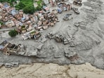 A drone view shows mud covering properties following a flash flood in Trishuli, Nuwakot district in Nepal.(Reuters)
