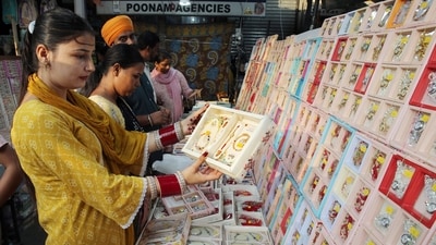Gram it: Rakhi shopping done? Here's how some Delhiites visited Sarojini Nagar market to buy rakhi for Raksha Bandhan as shops stocked on a huge variety from traditional to trendy designs. (Photo: ANI )