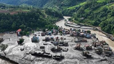 Floods washed away roads, bridges, houses, and power projects. (Reuters photo)