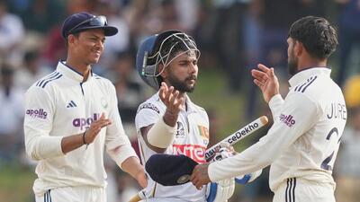 Sri Lanka's Sonal Dinusha is congratulated by the India players after the second Test in Colombo. (AP) Sri Lanka's Sonal Dinusha is congratulated by the India players after the second Test in Colombo. (AP)