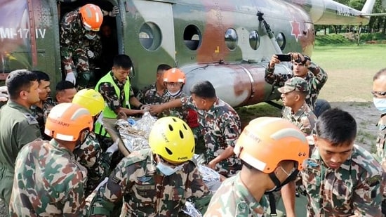 Nepal Army personnel conducts a rescue operation following a flash flood caused by an outburst in the Bhotekoshi River, on Wednesday. (Nepal Army/ANI Photo)