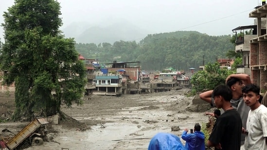 Nepal floods live: A view of damaged houses at a residential area by mud-laden floodwaters following a flash flood caused by an outburst in the Bhotekoshi River, in Nuwakot on Thursday. Nepal floods live: A view of damaged houses at a residential area by mud-laden floodwaters following a flash flood caused by an outburst in the Bhotekoshi River, in Nuwakot on Thursday.