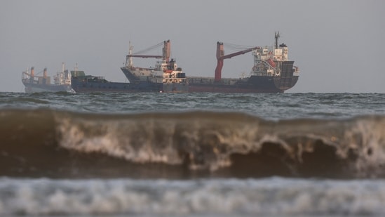 Vessels in the Strait of Hormuz are visible near the beach of Bandar Abbas, Iran, 