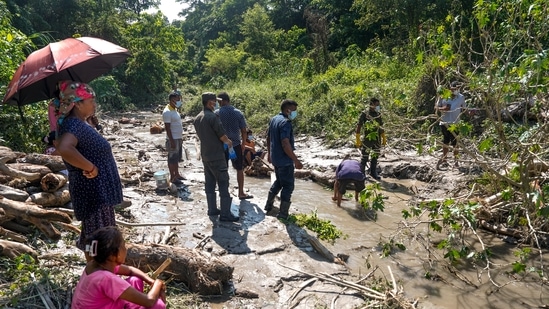 Police officials conduct a search and rescue operation after flash floods, in the Devghat area, Nepal. (Photo for representation)