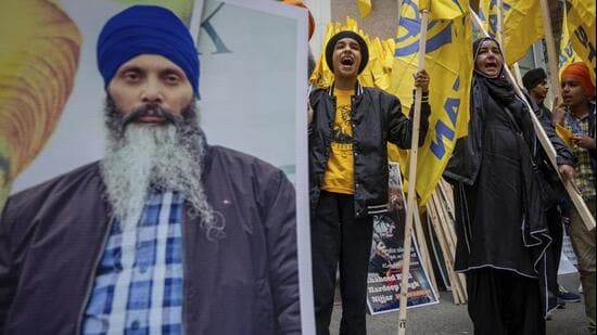 Protesters chant outside of the Consulate General of India office during a protest for the shooting of Hardeep Singh Nijjar in Vancouver, British Columbia, on June 24, 2023. (AP)
