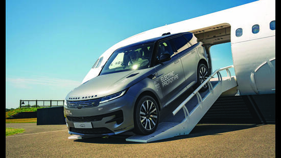 The Range Rover Sport EV glides over obstacles; it can even climb stairs.