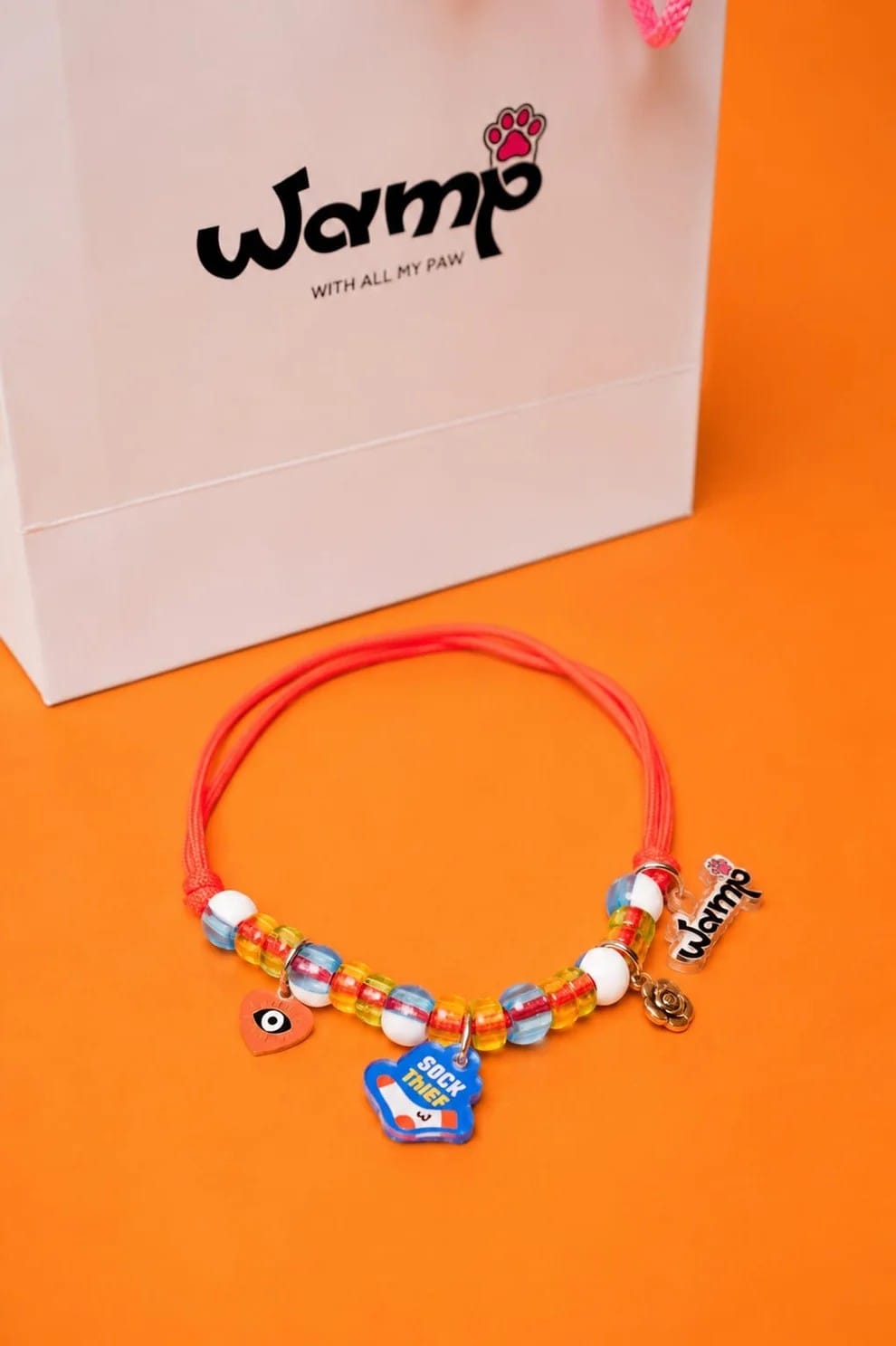 With All My Paw (WAMP)'s Sock Thief Pet Neck Rakhi for furry siblings who won't spare your socks! | Price:  ₹799 (Photo: With All My Paw (WAMP)/Website)