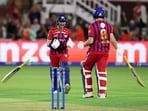 Manchester Super Giants' Liam Dawson celebrates with Leus du Plooy after hitting a six to win the Hundred men's final earlier this month.(Action Images via Reuters)