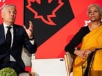 Canada’s Minister of Finance and National Revenue Francois-Philippe Champagne (left) and India’s Minister of Finance and Corporate Affairs Nirmala Sitharaman participate in a discussion at the Canadian Club.