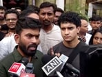 Cockroach Janta Party (CJP) founder Abhijeet Dipke and team members Saurav Das and Ratna Singh address the media in New Delhi.(PTI/File)