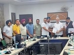 Food supplies employees during a meeting with consumer affairs minister Lal Chand Kataruchak in Chandigarh on Thursday. (HT)