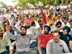 Government employees during the protest outside the Mini Secretariat in Ludhiana on Thursday. (Gurpreet Singh/HT)