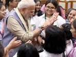 Continuing the annual tradition, schoolgirls visited the prime minister's official residence at 7, Lok Kalyan Marg, where they tied 'rakhis' on his wrist.(X/ Narendra Modi)