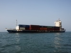 A vessel in the Strait of Hormuz visible near the beach of Bandar Abbas.