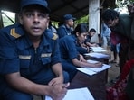 Nepal police collect details of missing people from relatives as they wait at Trishuli army camp, in Nepal's Nuwakot district on August 28, 2026. China and Nepal warned of fresh flooding risks, complicating rescuers' search for more than 1,400 people missing after a deadly deluge and landslides swept away entire villages along their remote Himalayan border. (Photo by Arun SANKAR / AFP)(AFP)