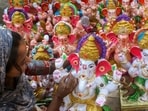 Gram it: An artisan gives final touches to an idol of Lord Ganesh ahead of the Ganesh Chaturthi festival, in Gurugram. This year, the 10-day festival will begin from September 14. 