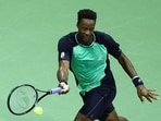 France's Gael Monfils plays a return. 