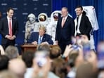 US President Donald Trump signs an executive order to create a US Space Academy at the NASA Johnson Space Center in Houston, Texas, US.(Bloomberg)