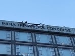 The 13 were arrested after a confrontation between TMC supporters and police during a KMC drive to remove an unauthorised billboard outside Abhishek Banerjee’s office.