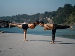 Couple yoga to try for a healthy relationship.(Unsplash)