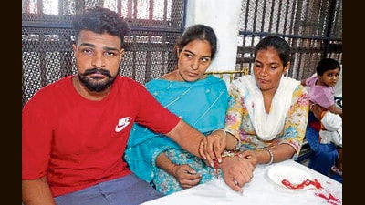 Ludhiana Central Jail authorities allowed women to meet their brothers for nearly 10 minutes to tie rakhis and exchange greetings. (HT Photo)