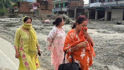 Women cover their faces to avoid a foul smell as they walk past damaged structures after flash flooding in the Devighat area of Nuwakot district in Nepal, Friday, Aug. 28, 2026. (AP Photo/Rajesh Kumar Singh) Women cover their faces to avoid a foul smell as they walk past damaged structures after flash flooding in the Devighat area of Nuwakot district in Nepal, Friday, Aug. 28, 2026. (AP Photo/Rajesh Kumar Singh)